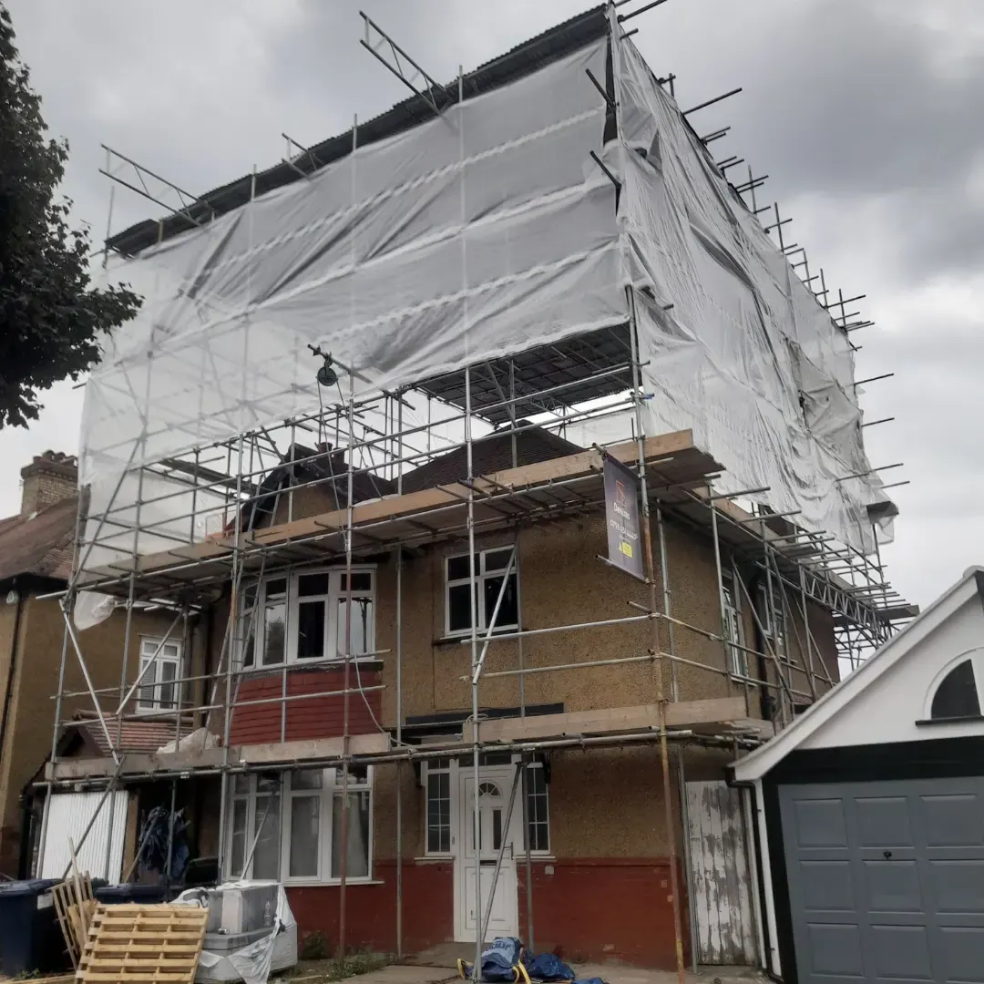 Pebbledash semi-detached house with full Monarflex encapsulation and Devlins board in Archway